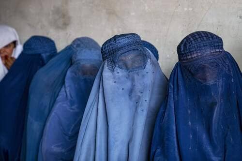 Taliban passes new law banning women from public speech and interaction with men