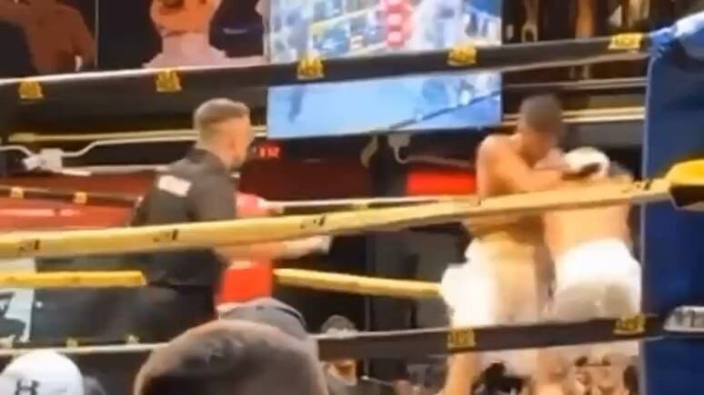 Бокс бўйича баҳсда қатнашган MMA жангчиси рақибини тепиб, нокаутга учратди