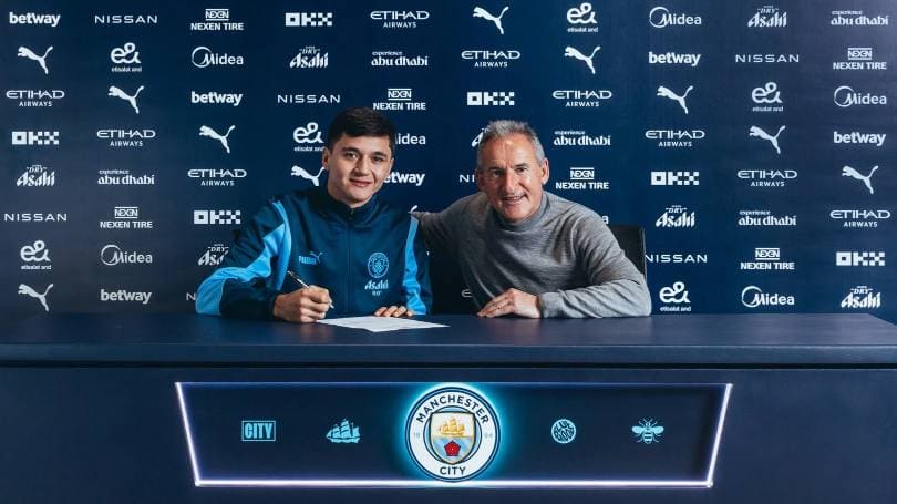 <p>Manchester City sign Uzbekistan defender Abdukodir Khusanov from Lens</p>