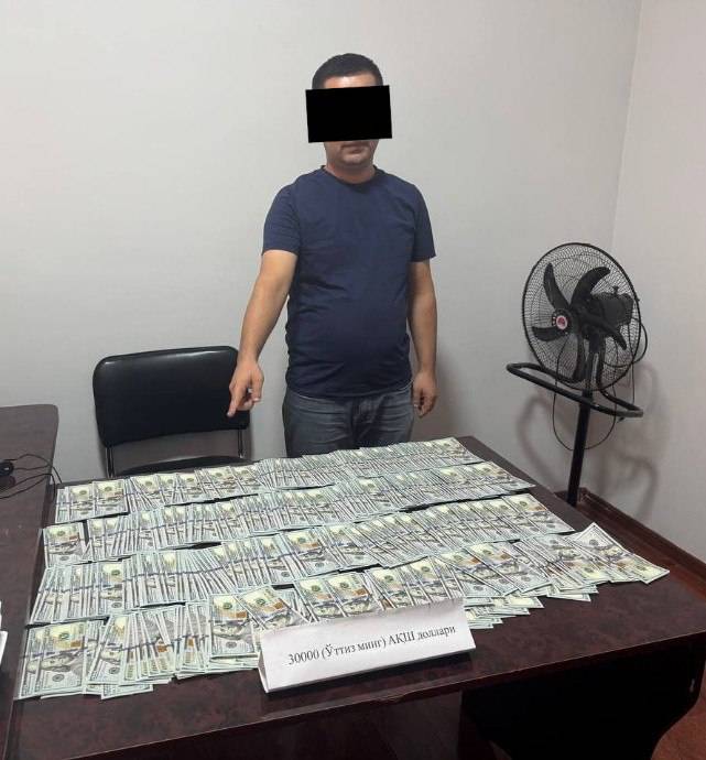 Фарғонада солиқ бошқармаси инспектори пора билан ушланди