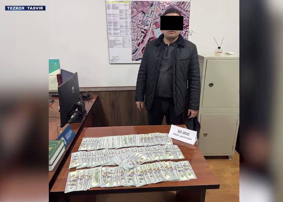 В Хорезме задержан сотрудник ОВД, получивший взятку в 30 тысяч долларов